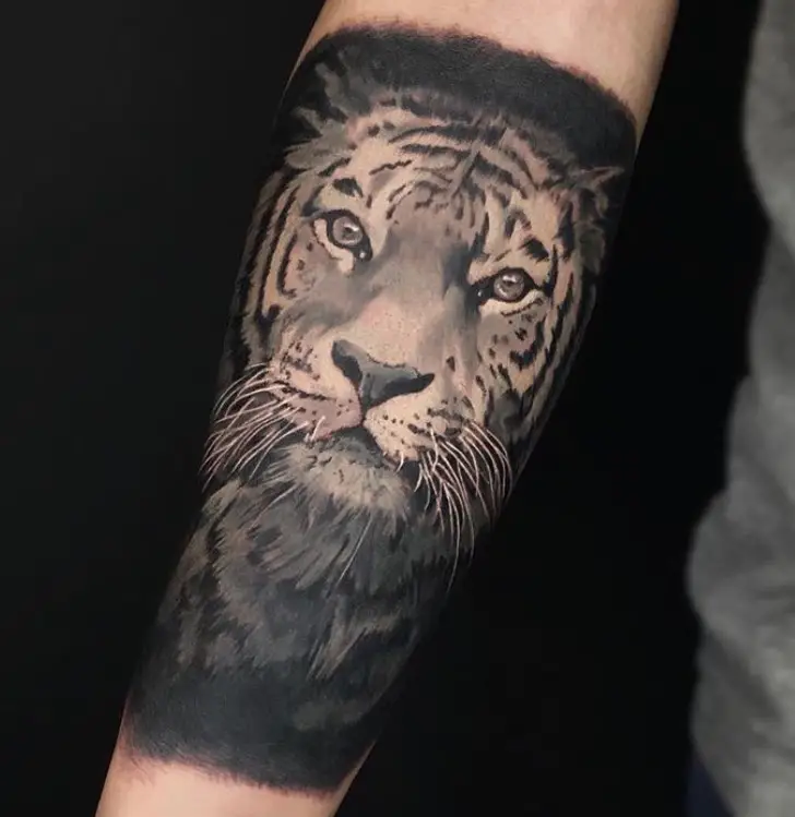 3D face of a Tiger Tattoo on the forearm