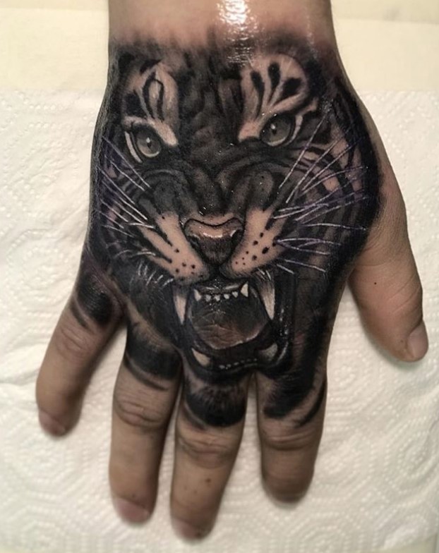 3D Tiger Tattoo on the hand of a man