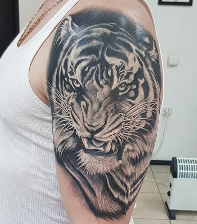 3D face of a Tiger Tattoo on the shoulder