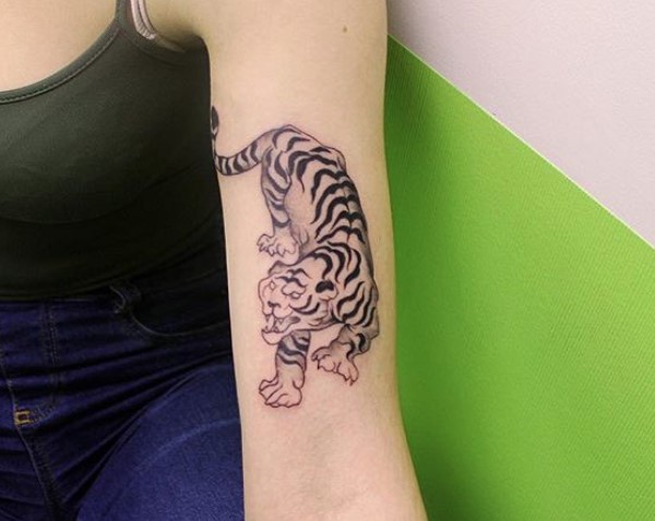 animated walking Tiger Tattoo on the biceps