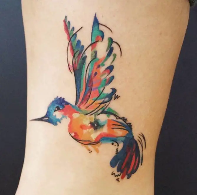 colorful hummingbird watercolor tattoo