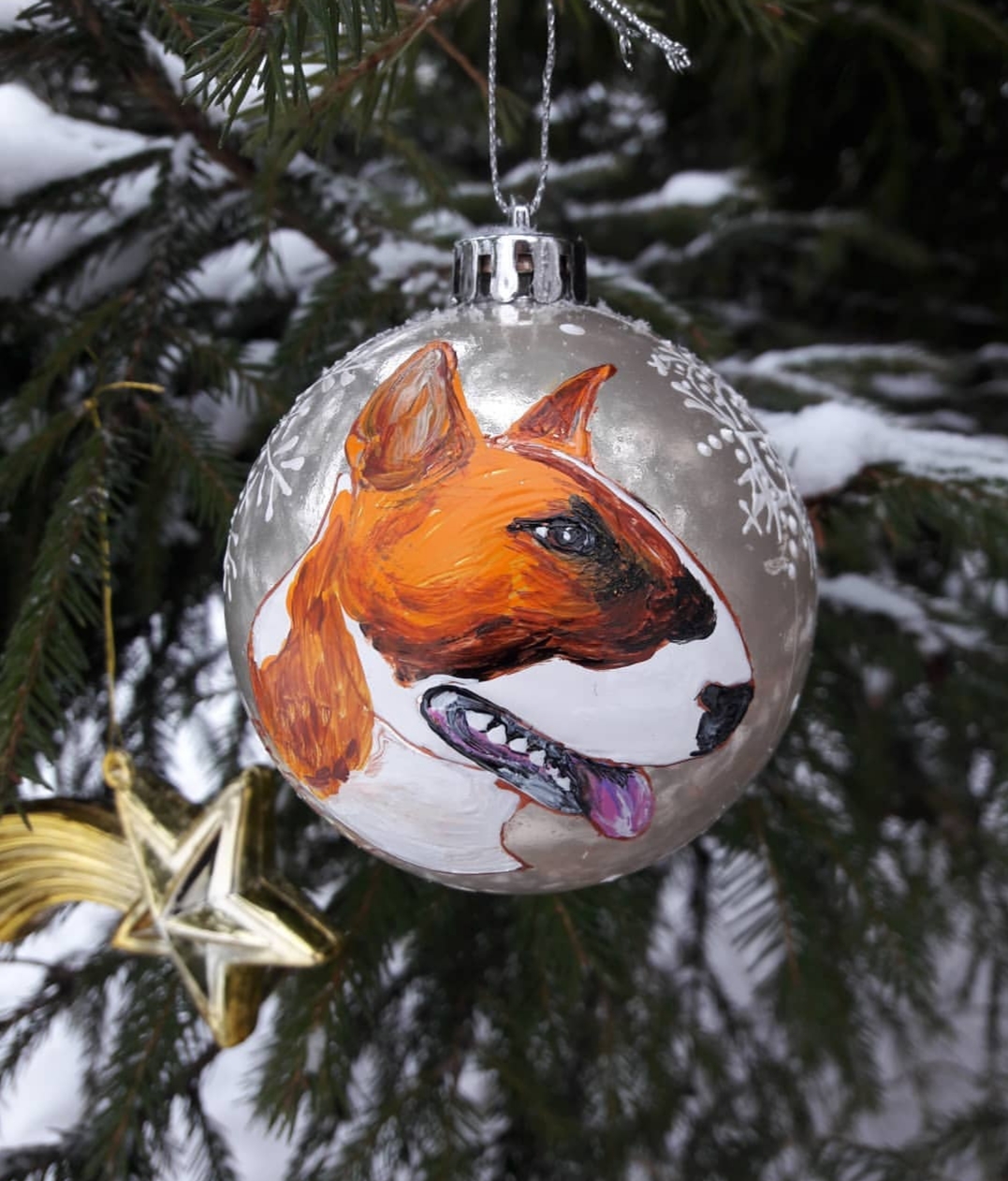 sideview face of a Bull Terrier painted on the christmas tree ornament 