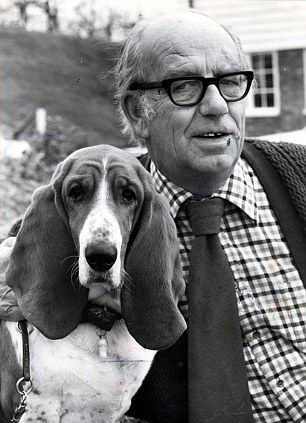 Black and white photo of a Alex Graham with his Basset Hound