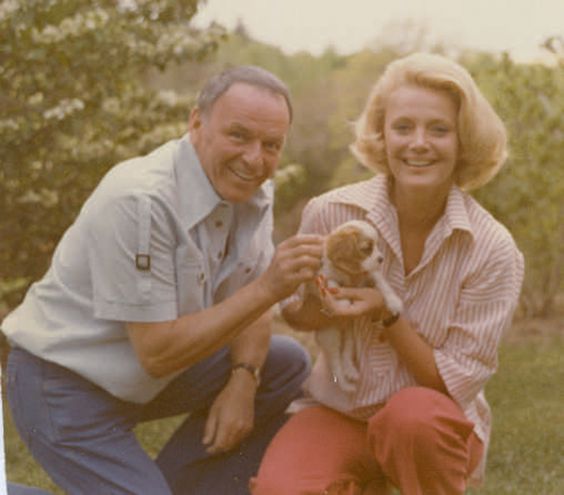 Frank Sinatra with their Cavalier King Charles Spaniel puppy