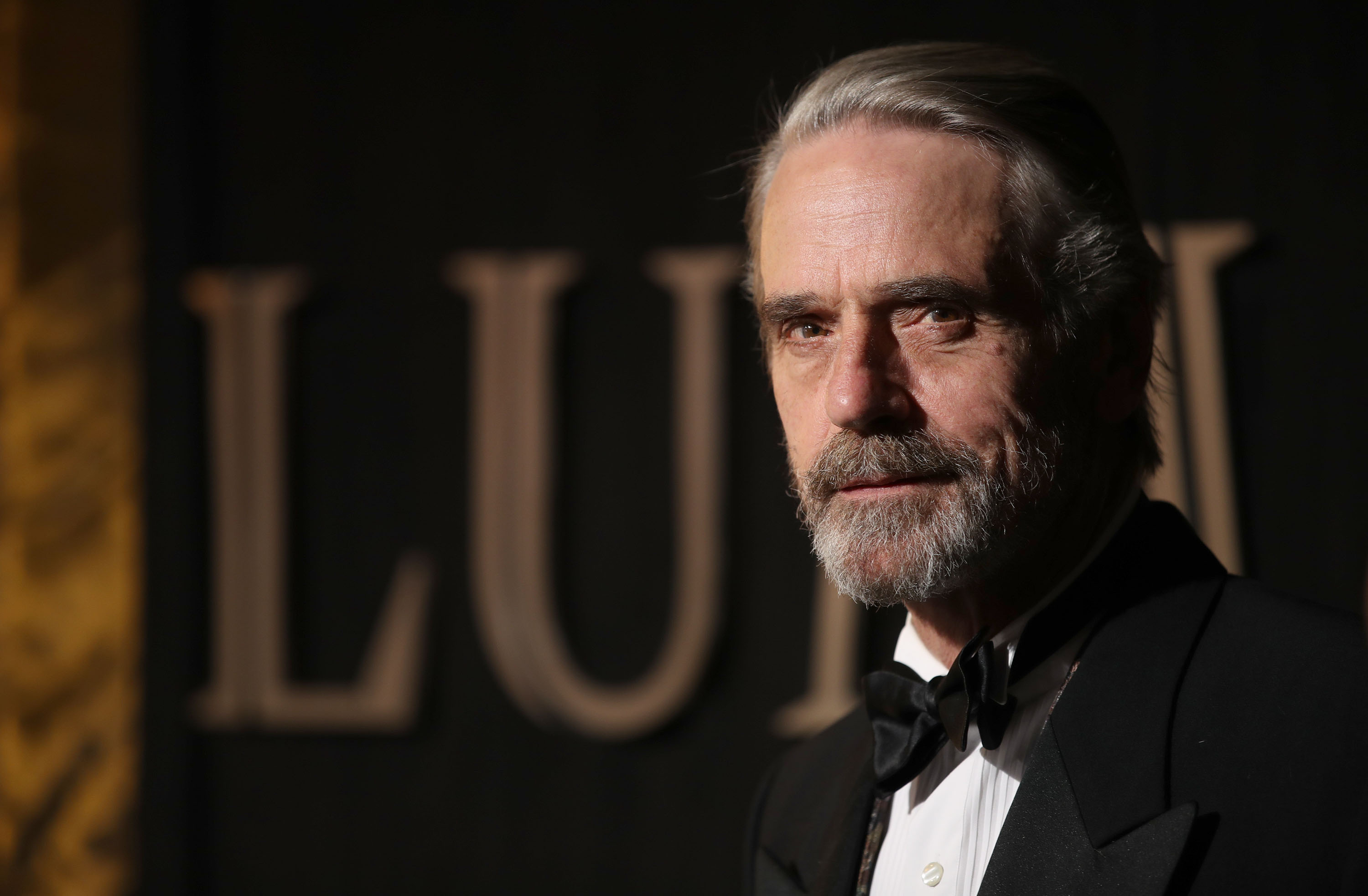 Jeremy Irons in his bow tie and black suit
