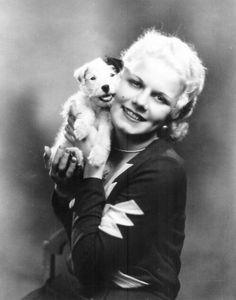 Jean Harlow hugging her Jack Russell puppy