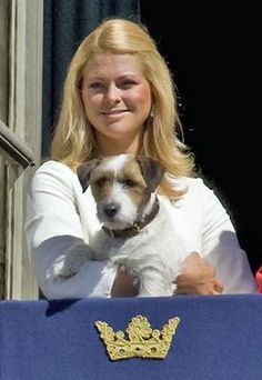 rincess Madeline of Sweden carrying her Jack Russell
