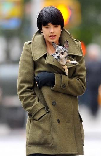 Agyness Deyn walking with her Chihuahua inside her jacket