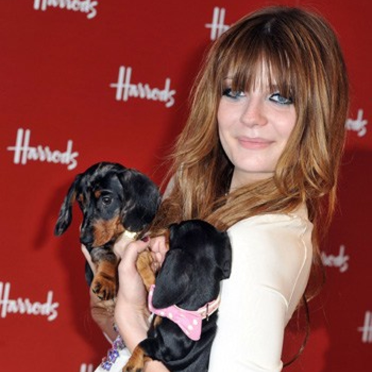 Mischa Barton with her 2 dachshund dogs