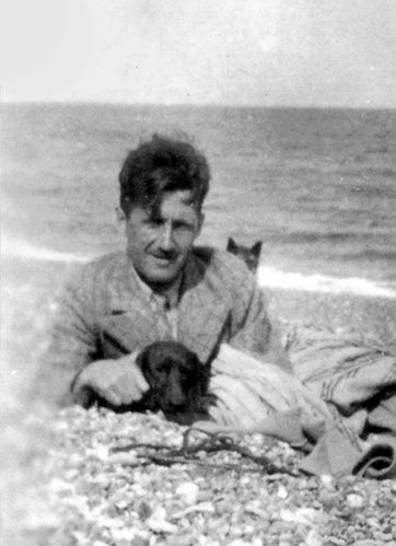 George Orwell at the beach with his Dachshund