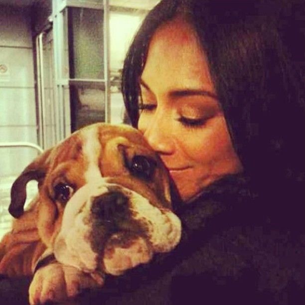 Nicole Scherzinger hugging her English Bulldog puppy