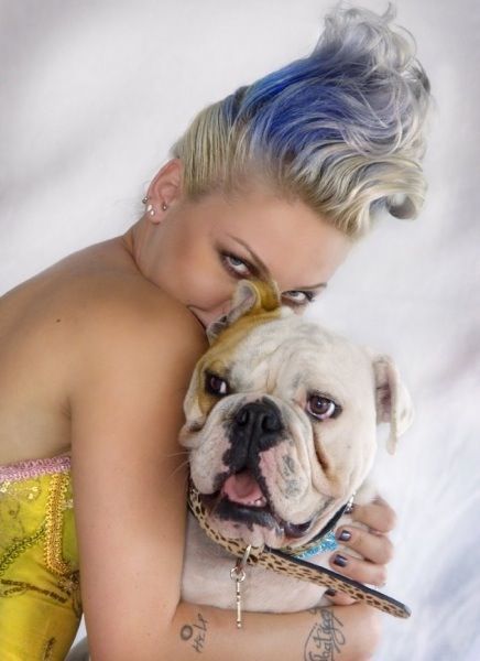 Pink hugging her English Bulldog