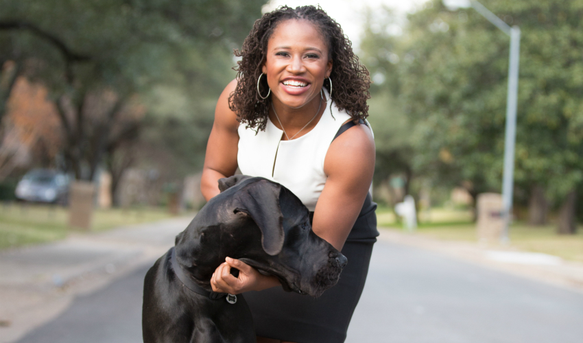 Lauryn Williams in the street with her Great Dane