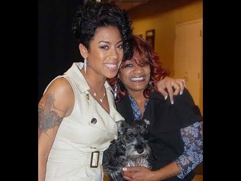 Keyshia Coles with her Schnauzer dog