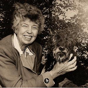 an old photo of Ms. Eleanor Roosevelt with her Schnauzer
