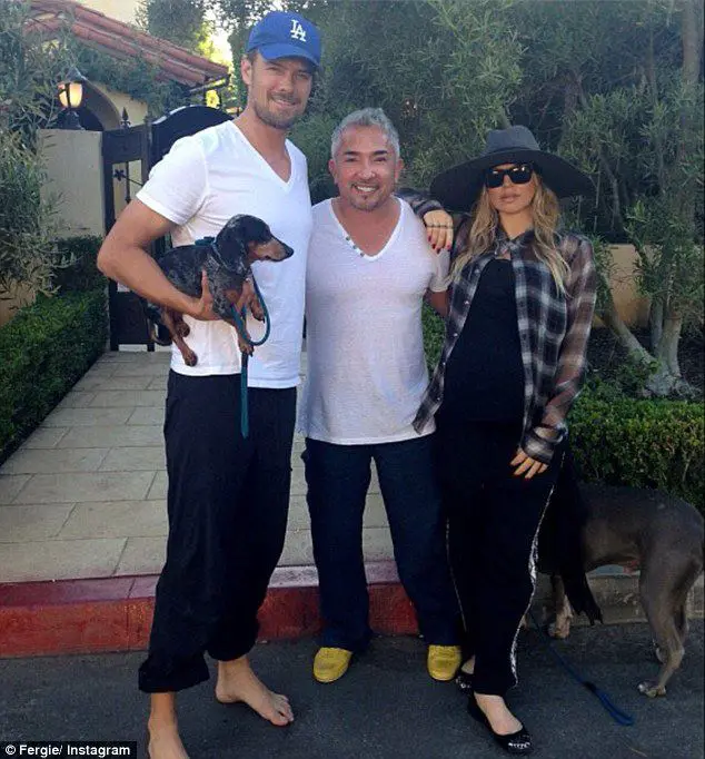 Josh and Fergie and their Dachshund with Cesar