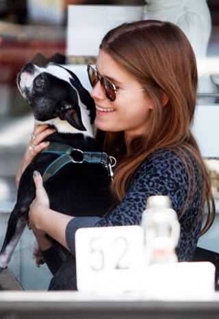 Kate Mara hugging her Boston Terrier