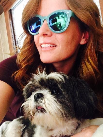 Rebecca Mader taking a selfie while looking sideways with her Shih Tzu