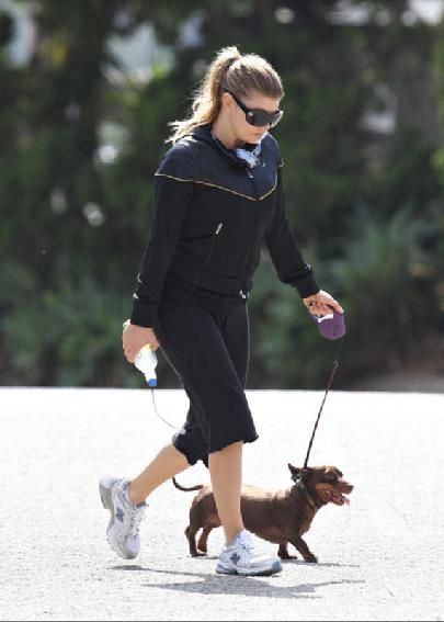 Fergie taking a walk with her Dachshund