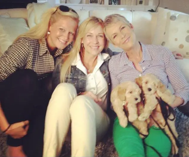 Jamie Lee Curtis and her two labradoodle puppies