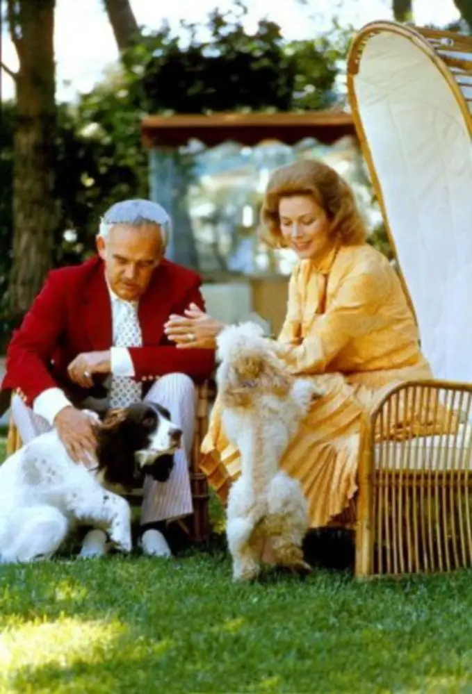 Princess Grace in the garden with her Springer Spaniel dog