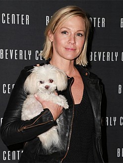 Jennie Garth with her Maltese name Roxie in her arm.