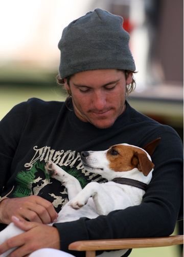 Jack Russell in its owners arms