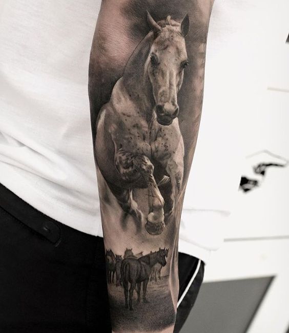 a 3D black and gray large and small Horse tattoo on the forearm