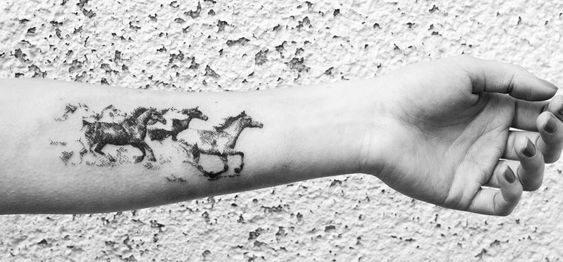 15 Spectacular Horse Tattoos and Their Symbolic Meanings - The Paws 15 Spectacular Horse Tattoos and Their Symbolic Meanings - The Paws