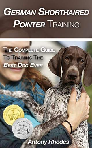 photo of a woman holding a German Shorthaired Pointer puppy and with title - German Shorthaired Pointer Training: The Complete Guide To Training the Best Dog Ever