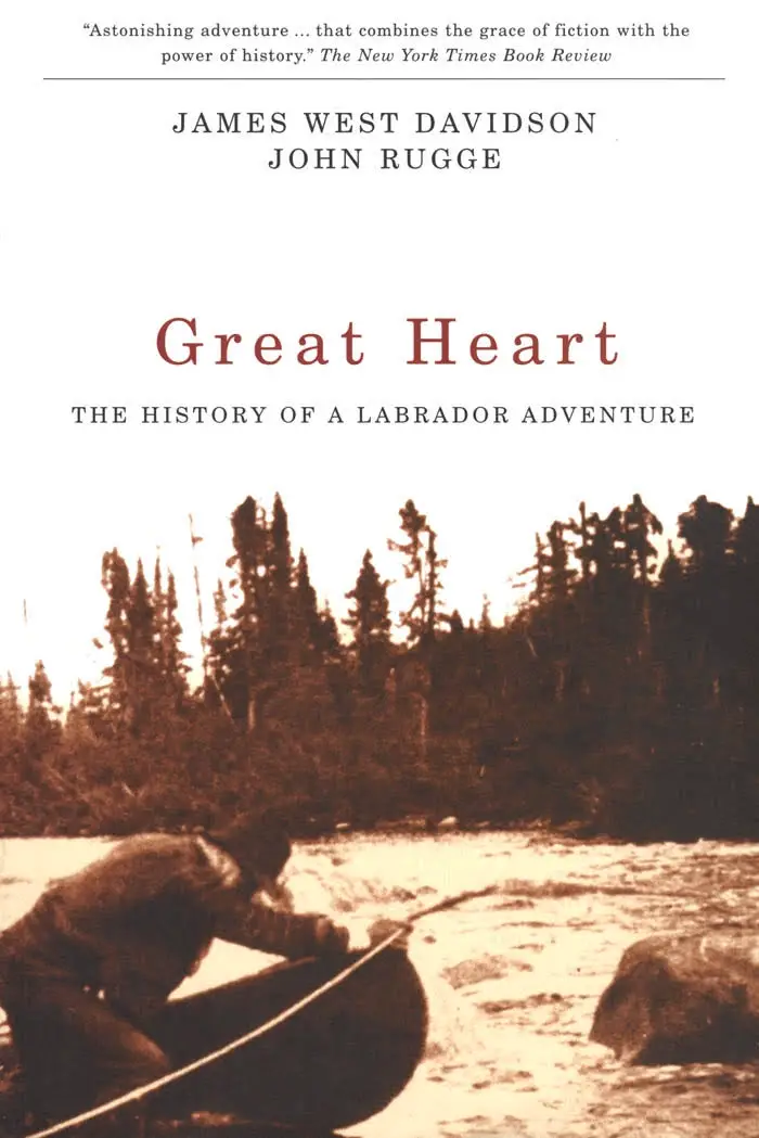 photo of a man by the lake with his boat and with title - Great Heart, the history of Labrador adventure