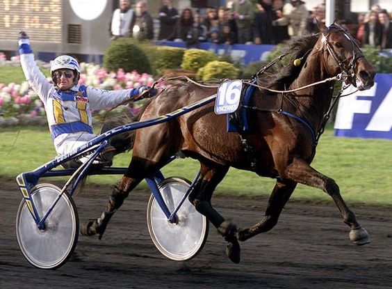 man in wheel riding a horse named Varenne