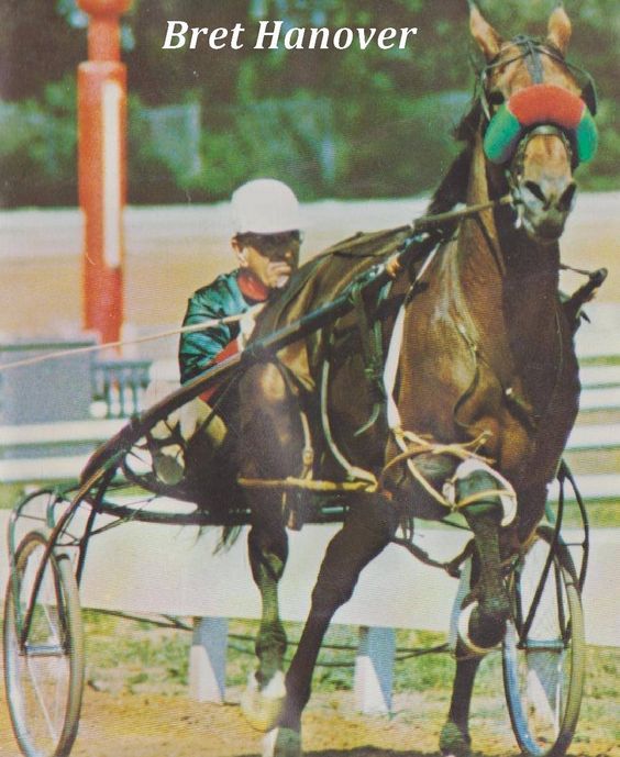 man riding a horse named Bret Hanover