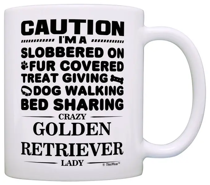 A white mug with print - Caution, I'm a slobbered on fur covered, treat giving, dog walking crazy Golden Retriever lady