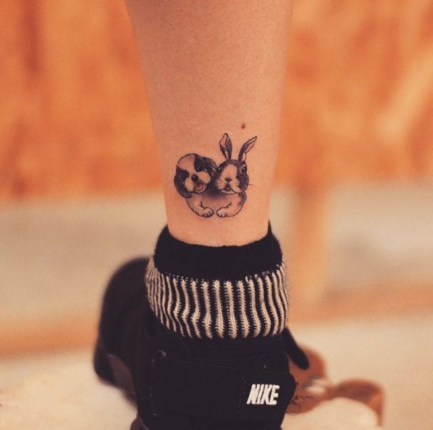 Shih Tzu and a bunny tattoo on the ankle