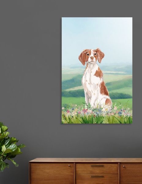 A painting of a Brittany sitting in the field of flowers on the wall