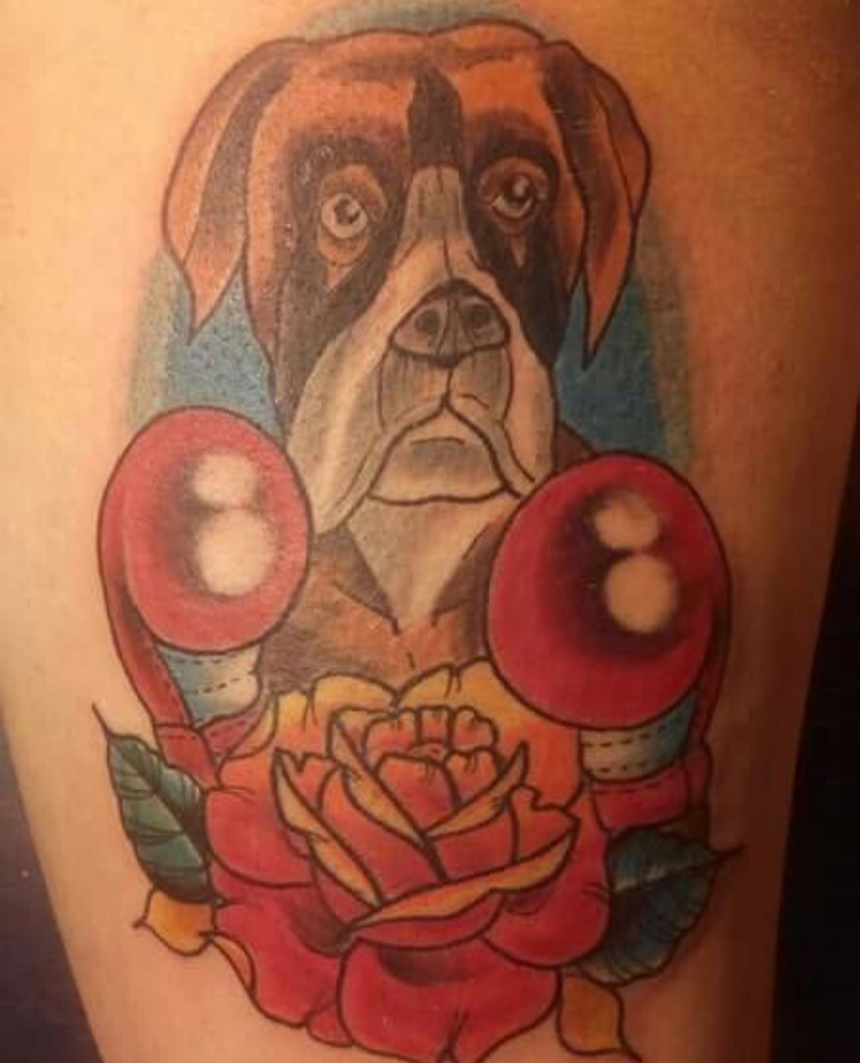 artistic Boxer with boxer gloves and flower tattoo