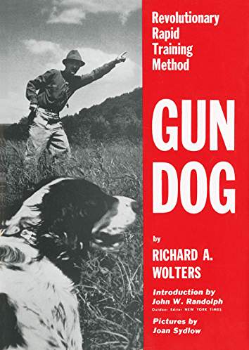 Photo of a Gun Dog with a man in front of him pointing on his left and with title - Gun Dog: Revolutionary Rapid Training Method