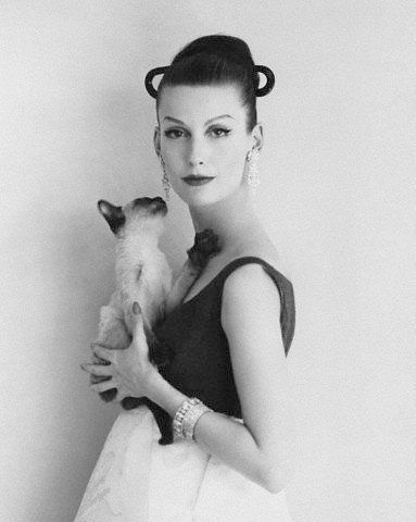 black and white photo of Mary Jane Russell with her Siamese Cat