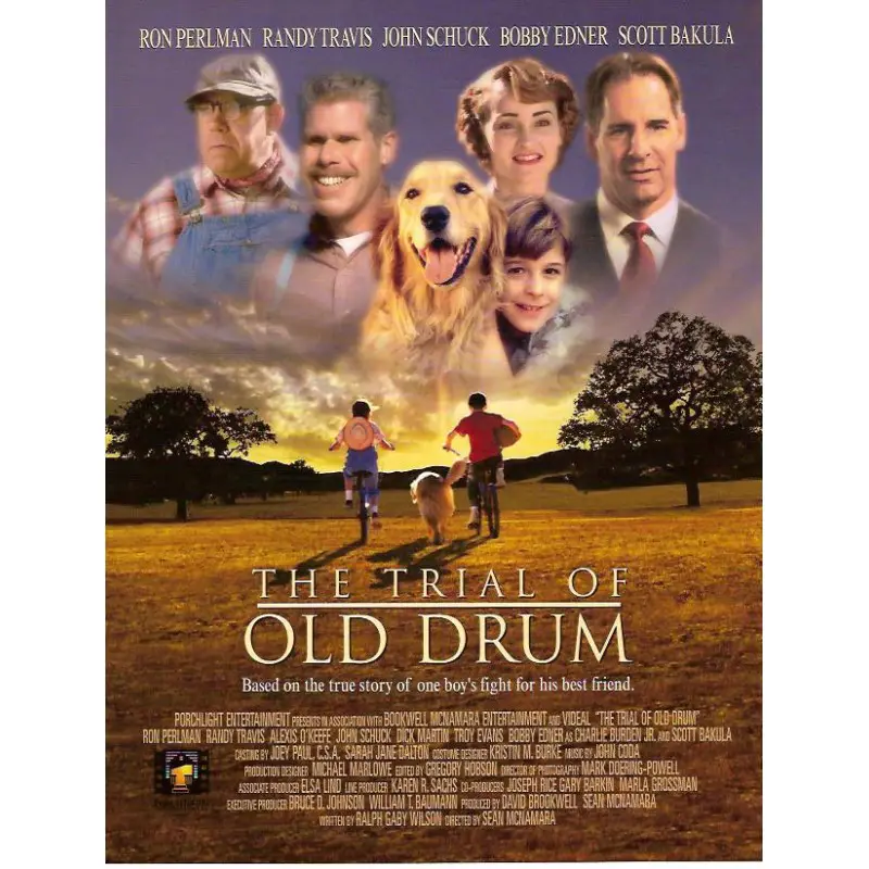 a book cover with a Golden retriever with other people and title - The Trial of Old Drum (2000)